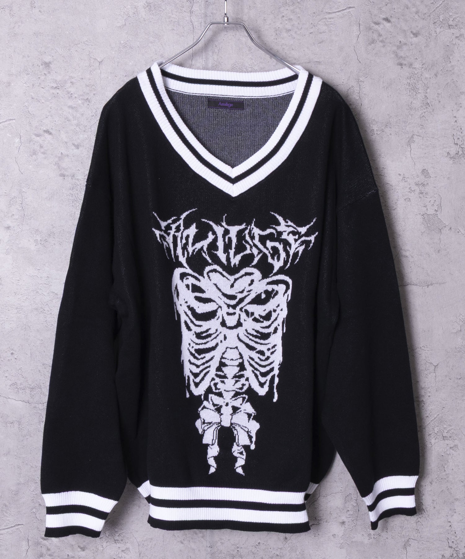 骨ロゴジャカードニット