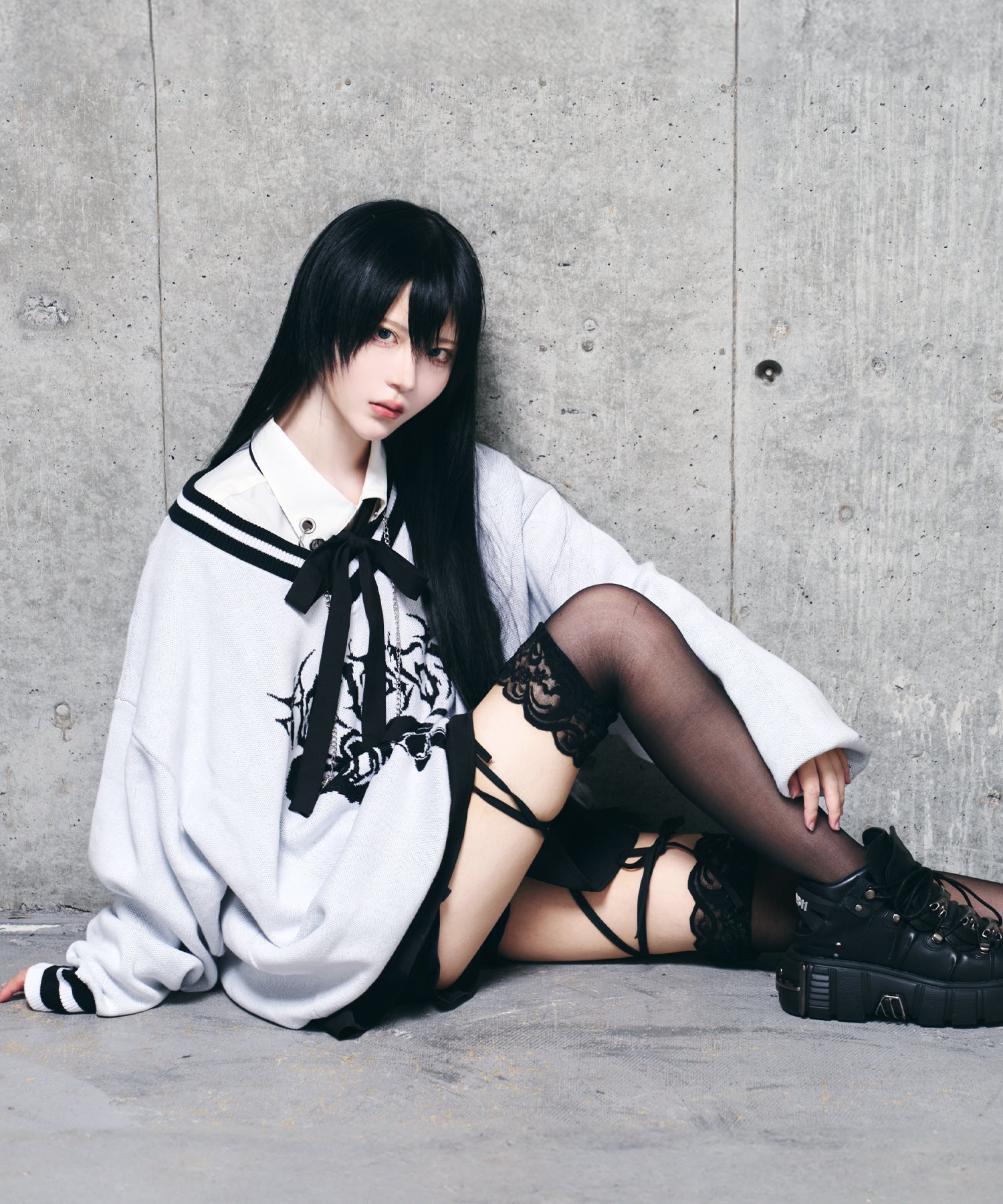 骨ロゴジャカードニット