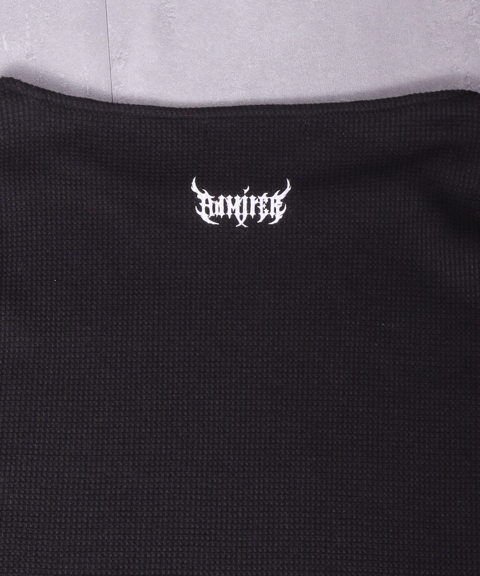 ワッフルコウモリプリントトップス