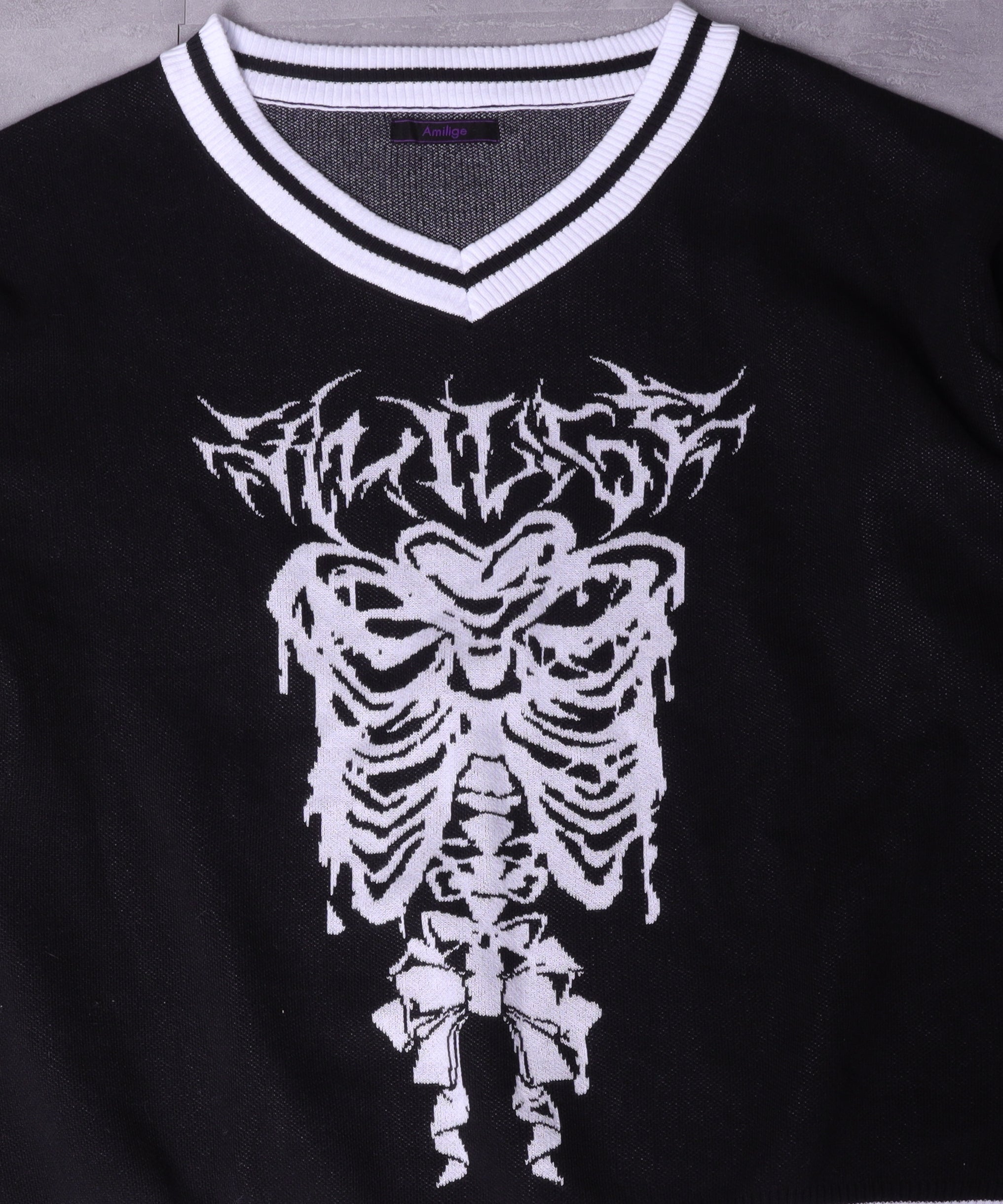 骨ロゴジャカードニット