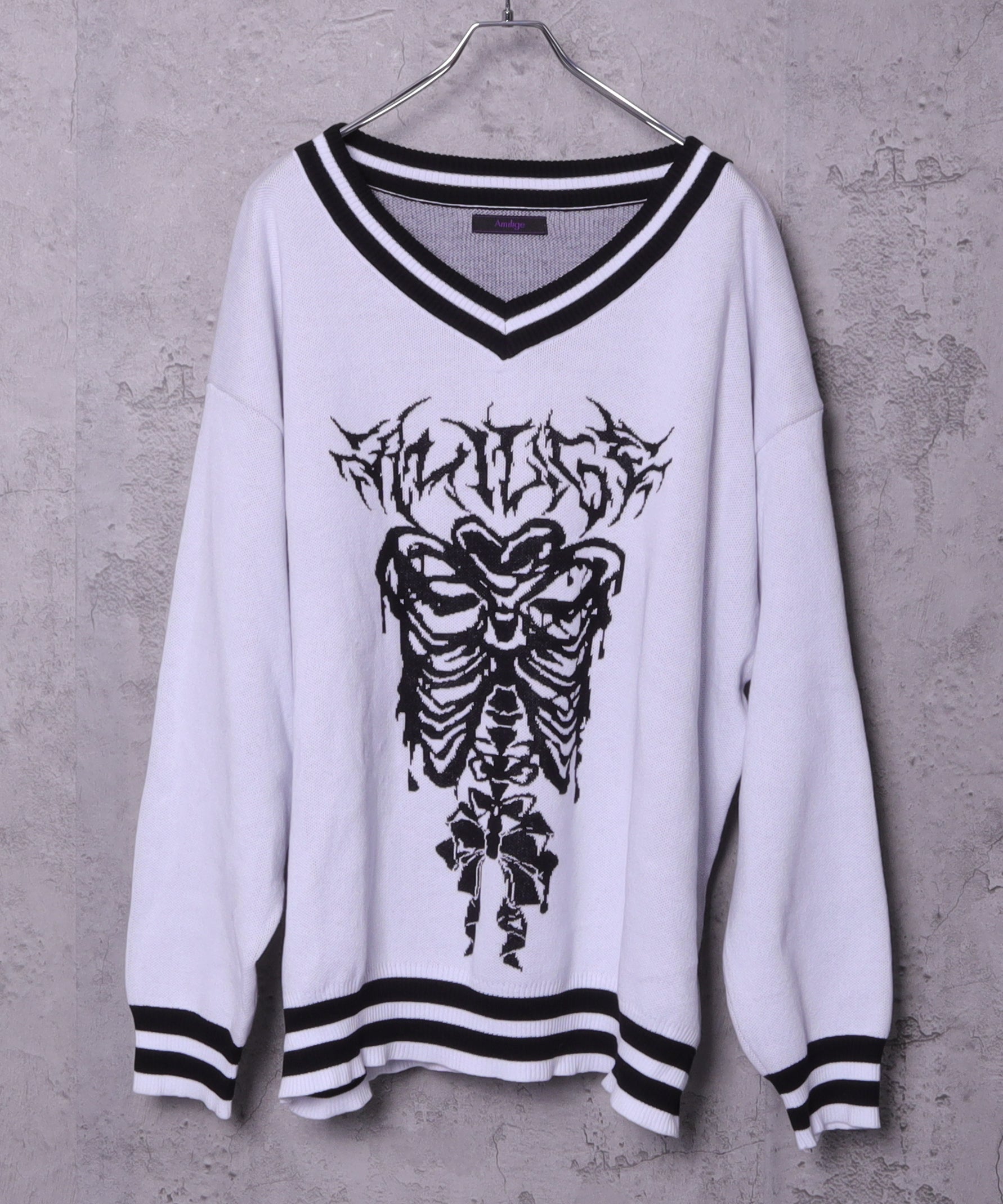 骨ロゴジャカードニット