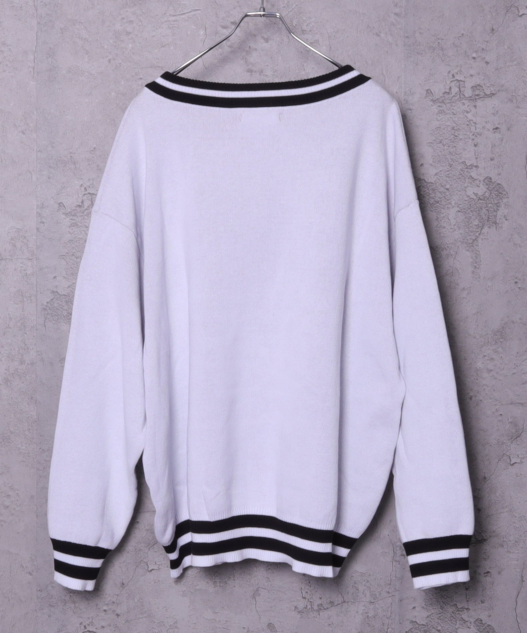 骨ロゴジャカードニット