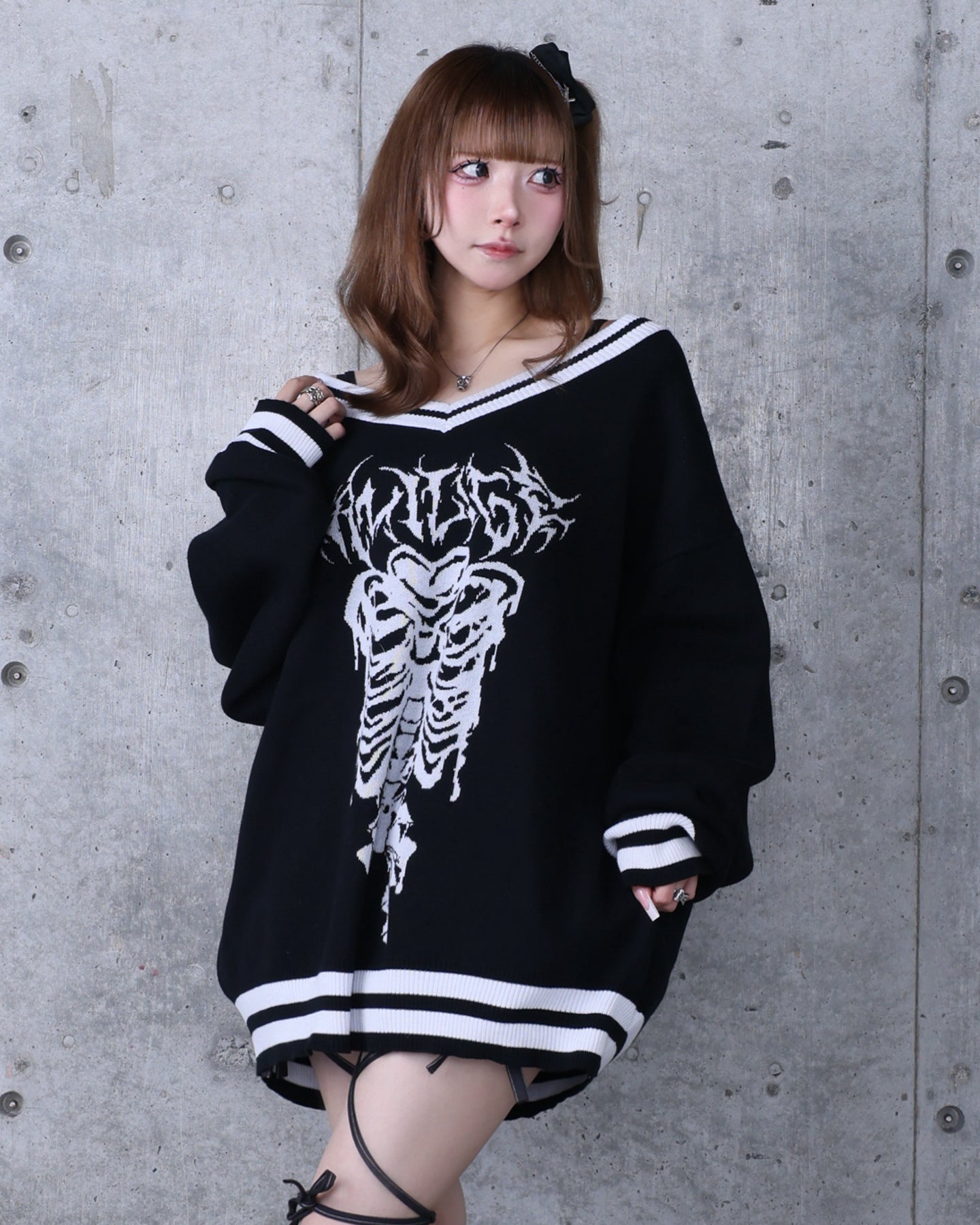 骨ロゴジャカードニット