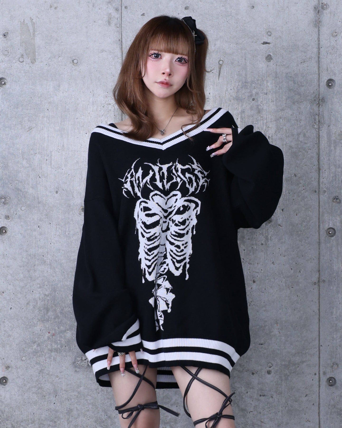 骨ロゴジャカードニット