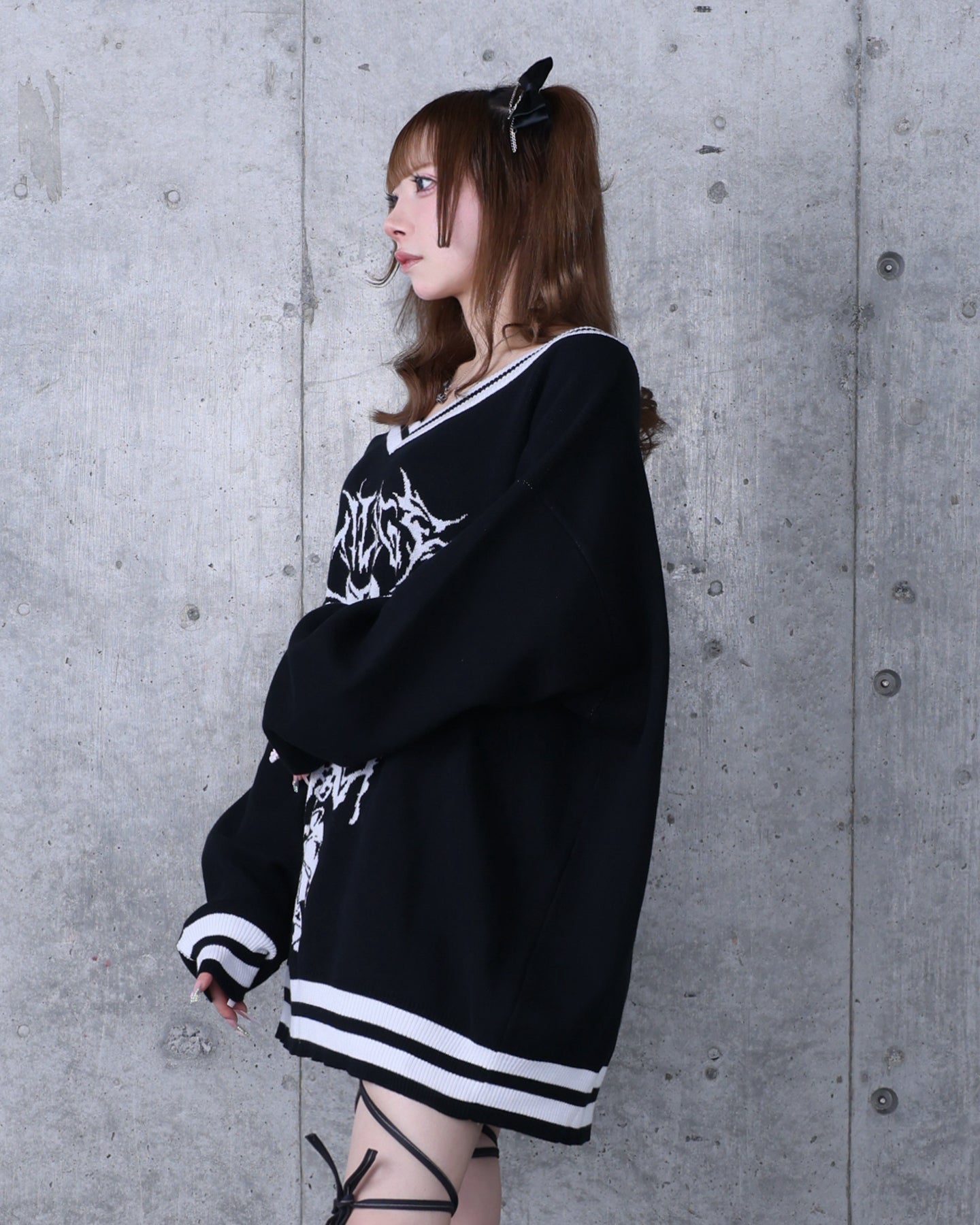 骨ロゴジャカードニット